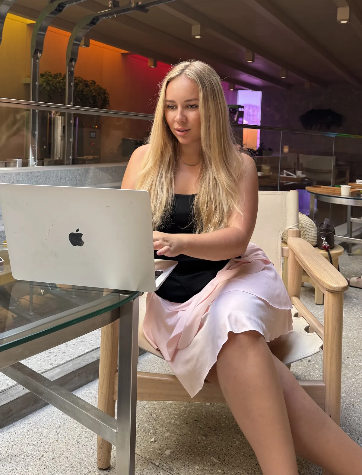 Irina Tsova at work on her laptop